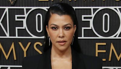 Kourtney Kardashian Cradles 9-Month-Old Son Rocky in New Photo - E! Online