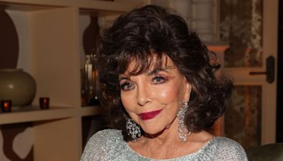 Joan Collins, 91, is ageless in printed midi dress and heels