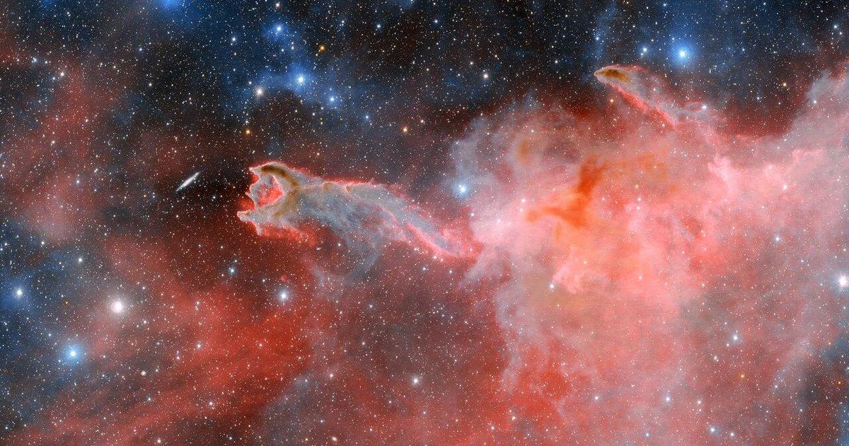 New image revealed of "ominous" cometary globule known as "God's Hand" as massive stars tear it apart