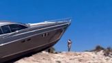 Moment tourists find yacht on top of sand dune after ‘navigation error’