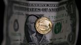 US dollar gains but set for worst monthly loss in a year, euro falls