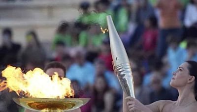 La llama olímpica recorrerá París en la fiesta nacional del 14 de julio