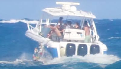 People Are Furious At Video Of Florida Boaters Dumping Trash Into The Ocean