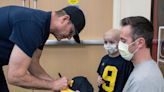 Michigan football shares championship vibes with familes at Mott Children’s Hospital