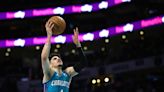 LaMelo Ball of the Charlotte Hornets attempts a lay up during the second half against the Houston Rockets at Spectrum Center on Jan. 26, 2024, in Charlotte, North Carolina.