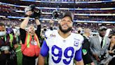 Rams star Aaron Donald lands a $95M contract restructure that now pays him like a QB