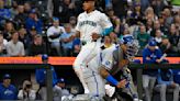 Jorge Polanco of the Seattle Mariners scores off of Luke Raley's single to right during the third inning against the Kansas City Royals at T-Mobile ...