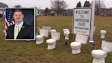 Harrison council member accused of driving across toilet protest property