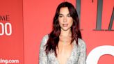 Dua Lipa Champions the Coquette Trend in a Bow-Adorned Gown With a Belly-Button Cutout