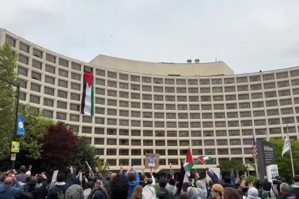 Anti-Israel protesters drape massive Palestinian flag over side of DC Hilton hosting White House Correspondents Dinner