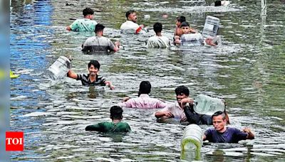 Flooding continues in Surat city | Surat News - Times of India