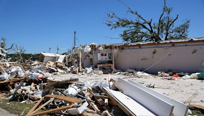 A tornado tore through a Barnsdall church May 6. But the altar — and a single lit candle — were untouched