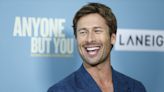 ‘Anyone But You’ Star Glen Powell Says He ‘Almost Died’ Filming Nude Scene With Sydney Sweeney