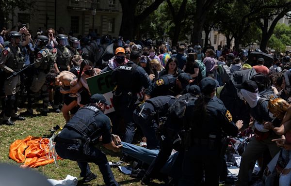 UT-Austin says protesters carried guns and assaulted people. Prosecutors haven't seen proof.