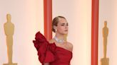 Cara Delevingne glows in elegant red dress at 2023 Oscars after sharing about sobriety