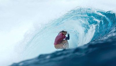 Fans Rave Over 'Iconic Scene' of a Whale Photobombing Olympic Surfers During Competition