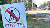 Hampton neighborhood campaigns against proposed cell tower to fix dead zone