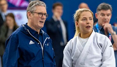 Keir Starmer wears a Team GB Adidas jacket to meet British athletes