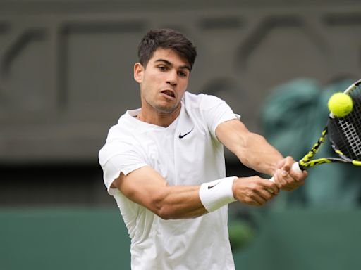 Carlos Alcaraz outlasts Frances Tiafoe at Wimbledon for five-set victory