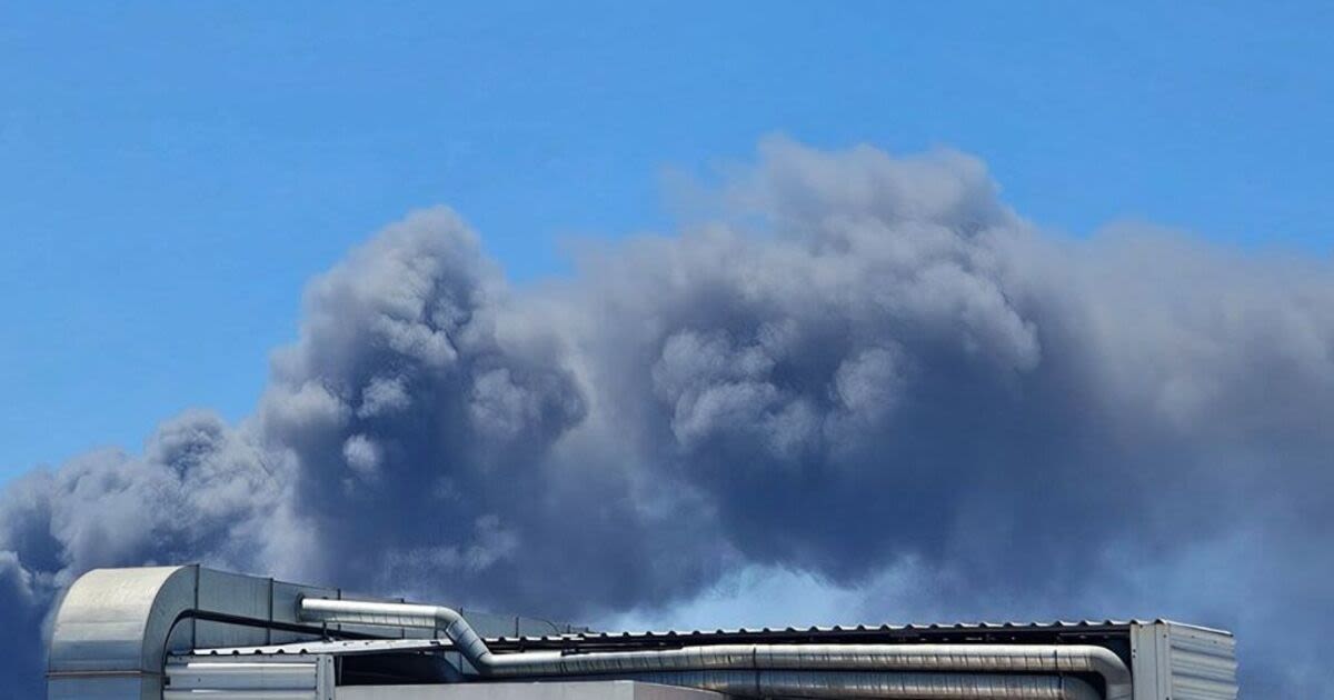 Huge delays at Ibiza airport as warehouse fire fills sky with smoke