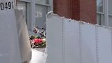 May Day: Flowers abruptly delivered to truck-eating bridge