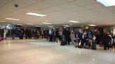 Glasgow Airport in chaos as hundreds of excited holidaymakers queue in car park