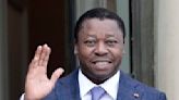 Togo's longtime leader signs a new constitution that eliminates presidential elections