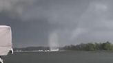 "Gustnado" churns across a Michigan lake. Experts say the small whirlwinds rarely cause damage