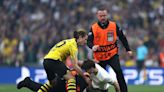 Champions League final delayed by three pitch invaders as Jude Bellingham targeted