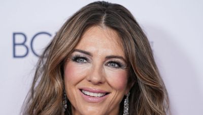 Elizabeth Hurley Shows Off Curves in Body-Hugging Hot Pink Gown for Special Event