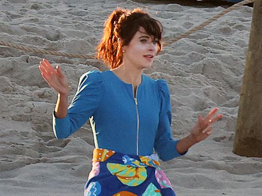 Zooey Deschanel rocks a bathing suit with Charlie Cox while filming Merv