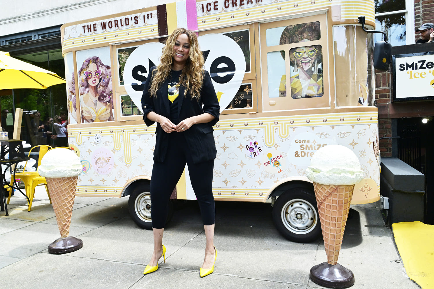 Why is Tyra Banks serving ice cream in Washington D.C.?