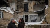 In cold Ukraine village, Banksy mural offers warm bath