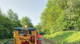 Tiny railcars rattle through Michigan backyards, towns this summer