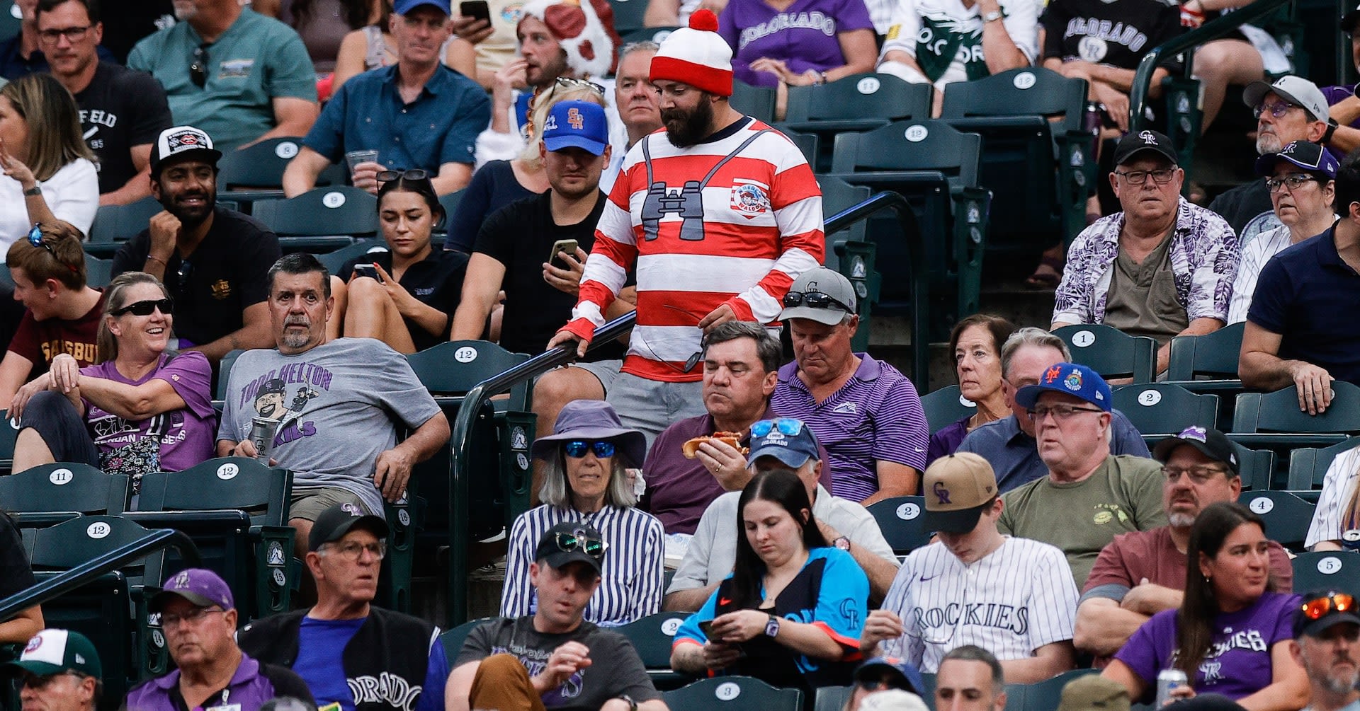 Rockies end losing streak by beating Mets