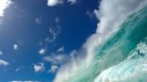 How do you photograph the world's most dangerous waves? You get thrashed.