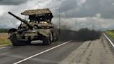 Russia scrambles troops, arms to counter Ukraine incursion