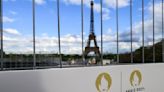 Olympic rings on Eiffel Tower unveiled 50 days ahead of Paris Games