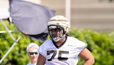 Taliese Fuaga knocking off the rust at left tackle in Saints rookie minicamp