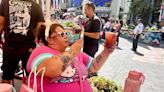 Here's who showed up at the opening of L.A.'s first Hello Kitty cafe. Some drove hundreds of miles