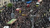 Millions attend funeral procession for Iran's Raisi in Tehran
