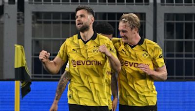 Dortmund win over PSG secures Germany an extra Champions League spot