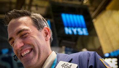 Stock market today: Dow, S&P 500 close at record highs, Nasdaq surges amid rate cut euphoria