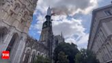 Watch: Fire engulfs spire of Iconic gothic cathedral in France - Times of India