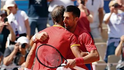 Djokovic eases past old foe Nadal