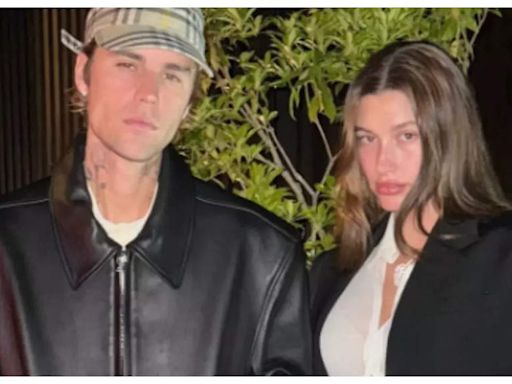 Justin Bieber cradles Hailey Bieber's baby bump as they pack on the PDA in new post; singer turns off comments | - Times of India