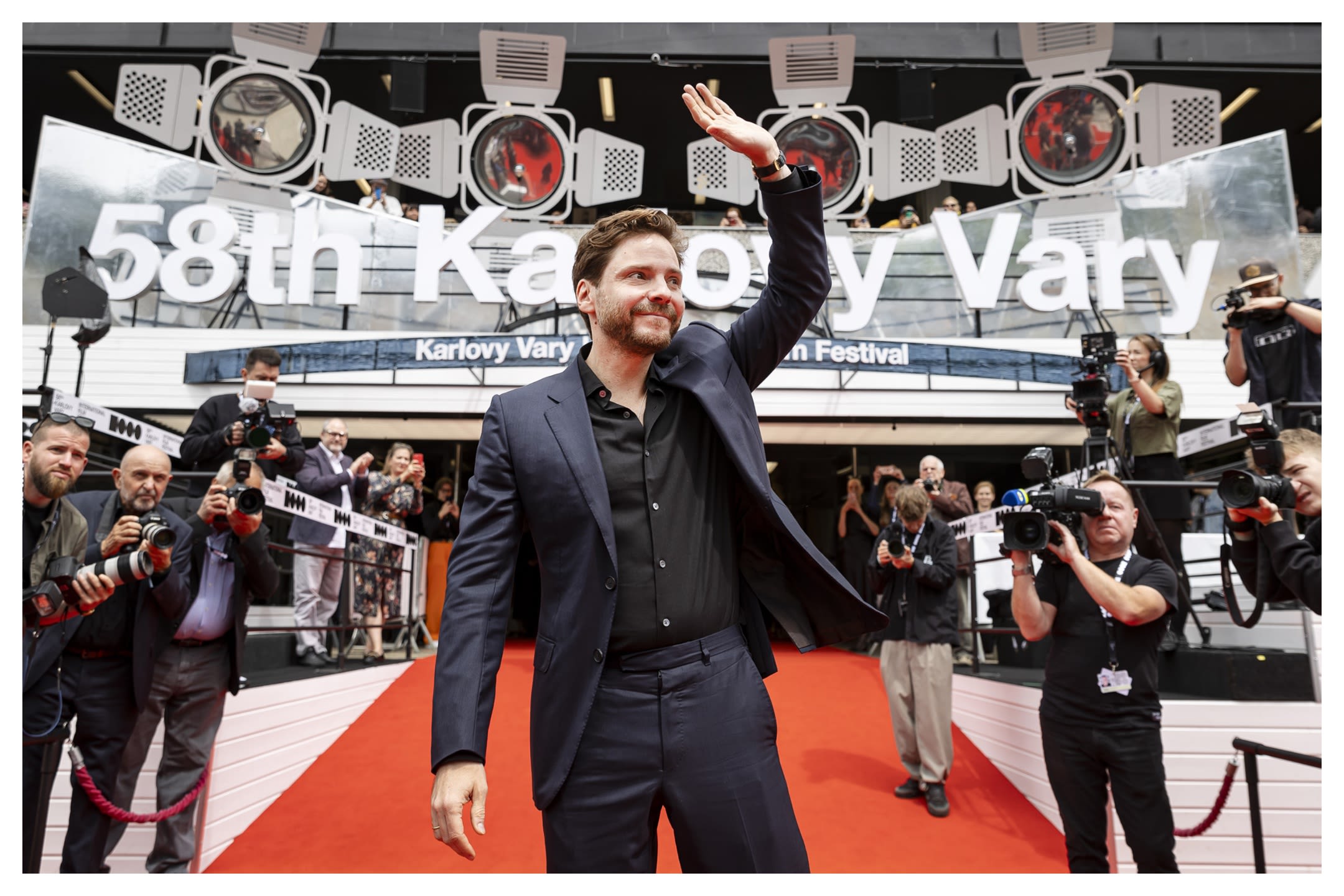 ...Daniel Brühl Talks Giving Jude Law a ‘Hard Time’ in Ron Howard’s ‘Eden,’ Working With ‘Maniac’ Ruben Östlund and...