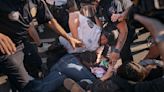 Pro-Palestinian protesters enter Brooklyn Museum, unfurl banner as police make arrests