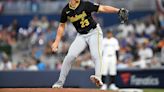 Pirates outlast Marlins in 12 innings to kick off season