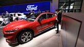 Ford posts Q2 profit, expects to produce 14,000 EVs this month